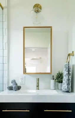 a bathroom with a sink and a mirror at Chic 2Bed And Large Serene Backyard in Heart of SD in San Diego