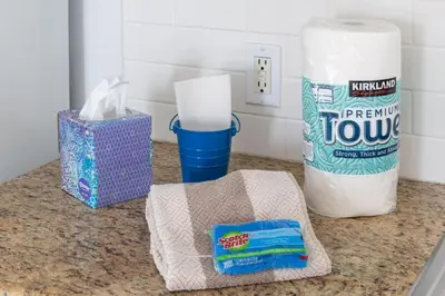 a counter with a roll of paper towels and a bag of toothpaste at Daniel - Oceanview in Newport Beach