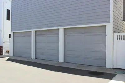 two garage doors on the side of a house at 5408 Seashore Dr A in Newport Beach