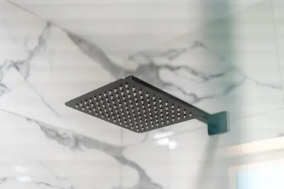 a black light fixture on a marble wall at Modern Oasis New 2BR in La Mesa in La Mesa