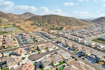 an aerial view of a city with houses and roads at Entire Private Home with 5 Bedrooms 3 Bathrooms, 3000 sqft, Gated Yard, Garage, Nice View, Available Now in Menifee