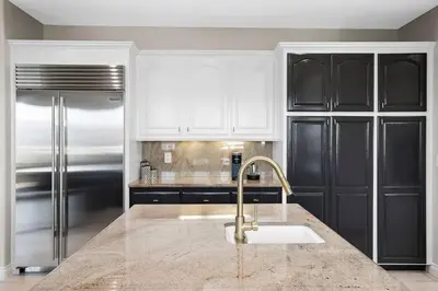 a kitchen with a sink and a refrigerator at Grenache Estate - Nestled in Temecula Wine Country in Temecula