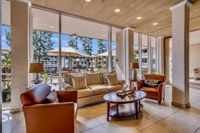 a living room with a couch and chairs and a table at Pacific Beach Resort Condo - Walk to the Beach in San Diego