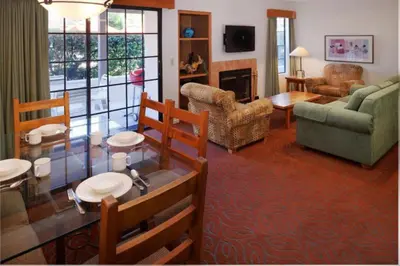 a living room with a couch and a table at Diamond Riviera Oaks Resort and Racquet Club 2BD in Ramona