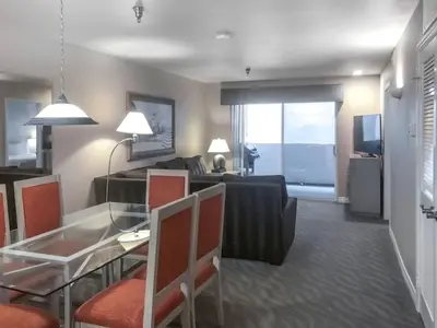 a living room with a couch and a glass table at Diamond - Riviera Beach and Spa Resort 2bd in Dana Point