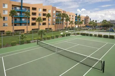 a tennis court in front of a building at WorldMark Oceanside 2BD in Oceanside