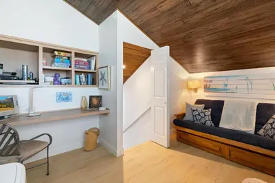 a living room with a couch and a wooden ceiling at Picturesque Perfection in Leucadia in Encinitas