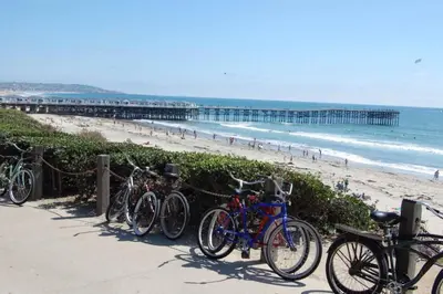 a group of bikes parked next to the beach at Ocean Breeze 2 bedroom in San Diego