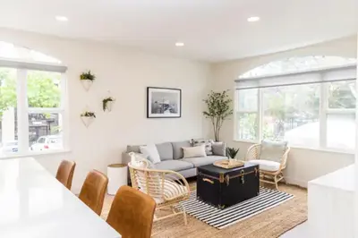 a living room with a couch and chairs at Cheerful 4BD Home in the Heart in San Diego