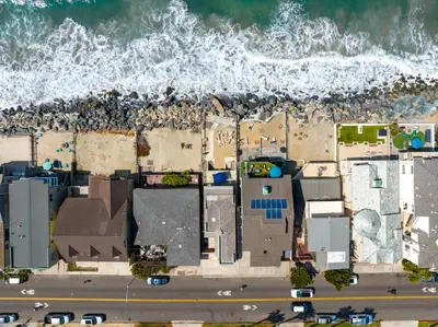 an aerial view of the beach and the ocean at Sunsets at the Beach House in Oceanside