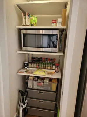 a small refrigerator with a microwave and some food at San Diego Oasis with Hot Tub, Gym, Outdoor Theater, Huge Yard in San Diego