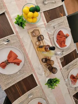 a table with plates of food and drinks on it at San Diego Oasis with Hot Tub, Gym, Outdoor Theater, Huge Yard in San Diego