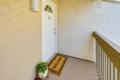 a welcome mat in front of a white door at San Diego Condo with Pool Access about 2 Mi to Beach! in San Diego