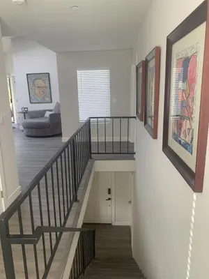 a staircase in a house with a living room at San Clemente Beach home walk to beach and downtown in San Clemente