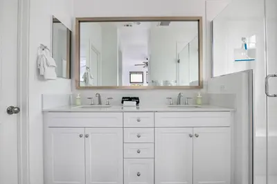 a white bathroom with two sinks and a mirror at Better Two-Gether 2-bed 2,5-bath in Oceanside