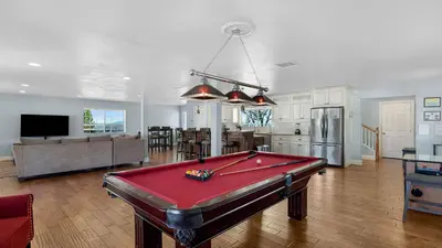 a living room with a pool table in it at Wine Country Retreat Gorgeous Views Minutes to Wineries in Temecula