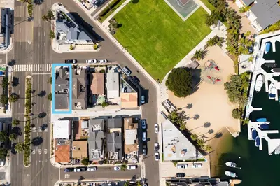 an overhead view of a street with houses and a beach at Perfect Surf Casa in Newport Near Beach and Pier in Newport Beach