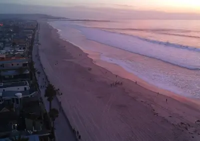 an aerial view of a beach at sunset at Ocean, Bay, Downtown, and City view Condo, Few steps from the ocean in San Diego