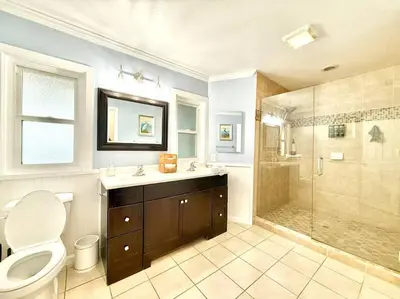 a bathroom with a toilet sink and a shower at The Cozy Ranch Retreat in San Diego