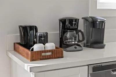 a tray of appliances sitting on a kitchen counter at Beach Abode Walk to the Ocean in San Diego
