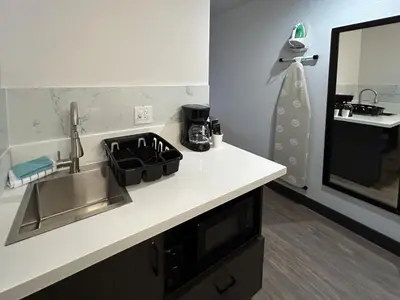 a kitchen with a sink and a counter top at Studio 6 San Diego, CA Hotel Circle Mission Valley in San Diego