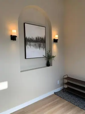 a white room with a picture on the wall at New Constructed Home in Poway in Poway