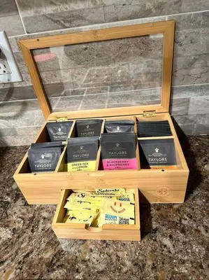 a wooden box filled with different types of cheese at Anselmo in Mission Viejo