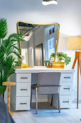 a white desk with a mirror and a chair at Gorgeous Villa Steps to La Jolla Cove in San Diego