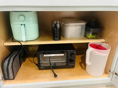 a shelf with a microwave and other kitchen items on it at NEW CA Coastal Beauty 6 mins to Imperial Beach in San Diego