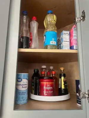 a cupboard filled with lots of bottles of alcohol at NEW CA Coastal Beauty 6 mins to Imperial Beach in San Diego