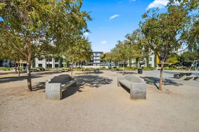 a park with benches in the sand and trees at King Bed, Pool, Hot Tub, Arcade Room, Gym, Parking in San Diego