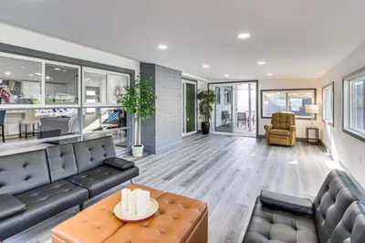 a living room with a couch and a table at Mission Valley Home 5 Mi to SDSU Campus in San Diego
