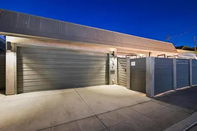 a pair of garage doors on a building at Ventana Vista, Ocean View in San Diego