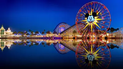 a ferris wheel and the disneyland resort at night at Redecorated - Serene- Legoland- Family-Friendly in Carlsbad