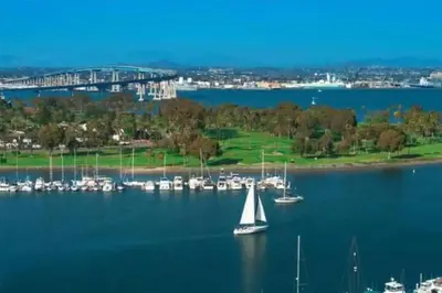 a sailboat in the water near a group of boats at Majestic Lux Home with Heated Pool and Spa! in San Diego