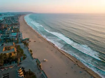 an aerial view of a beach at sunset at Majestic Views Pool&Jacuzzi, Mini Golf, Playground in Spring Valley
