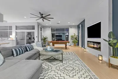 a living room with a couch and a table at Massive 7BR Stunning MTN View Zen Retreat Pool and Spa in Ramona