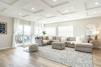 a living room with a couch and a rug at 1 Block to Sand Stylish 3BR Contemporary Home in San Diego