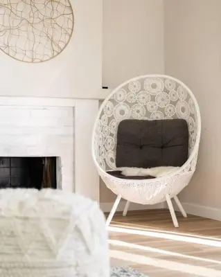 a white chair in a room with a fireplace at 1 Block to Sand Stylish 3BR Contemporary Home in San Diego