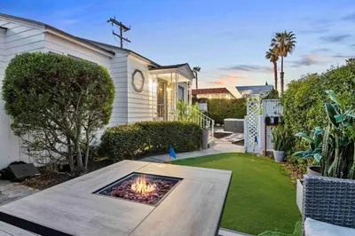 a backyard with a fire pit in the yard at PB 3BR Beach Retreat Hot Tub Mini Golf in San Diego