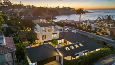 an aerial view of a house with the ocean at Pacific Perfection - Ocean Views Jacuzzi Walk to Beach and Dining in San Diego