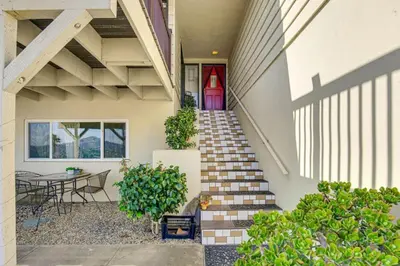 a staircase leading to a house with a table and chairs at Amazing Views with massive pool Total Oasis in La Mesa