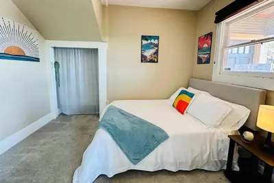 a bedroom with a bed and a window at 3-Bedroom, Prime Location, Private Backyard! in San Diego