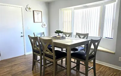 a dining room with a table and chairs at San Diego Fun-Gameroom & Gazebo-Centrally Located! in San Diego