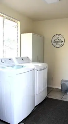 a white washer and dryer in a room at San Diego Fun-Gameroom & Gazebo-Centrally Located! in San Diego