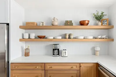 a kitchen with wooden shelves and a coffee maker on a counter at Modern Escape w Mountain Views, Walk to Lake, Golf, Resort, Dining in San Marcos