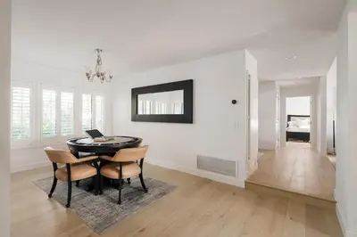 a dining room with a black table and chairs at Stunning Private Resort with Pool in San Marcos