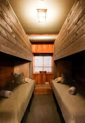 a room with two beds and a window at Bamboo Loft 6BR, 24 guests in San Diego