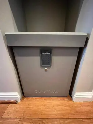 a box with a remote control in the corner of a room at Bamboo Loft 6BR, 24 guests in San Diego