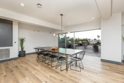 a dining room with a table and chairs at Eclectic Fast Wi-Fi Parking Pets Bohemian in San Diego
